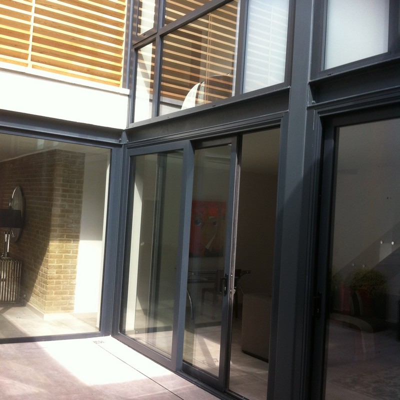 Anthracite aluminium sliding patio doors fitted in Neasden